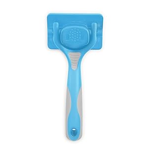 self cleaning slicker a brush for dogs with a blue plastic handle 